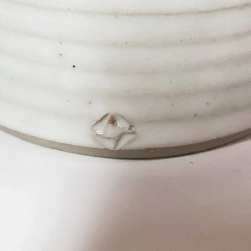 Pottery hand thrown utensil holder, white and blue, marked near base,‎ texture
